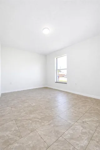 an empty room with a window