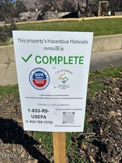 a sign on the side of a park