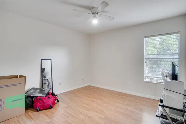 a living room with furniture and window