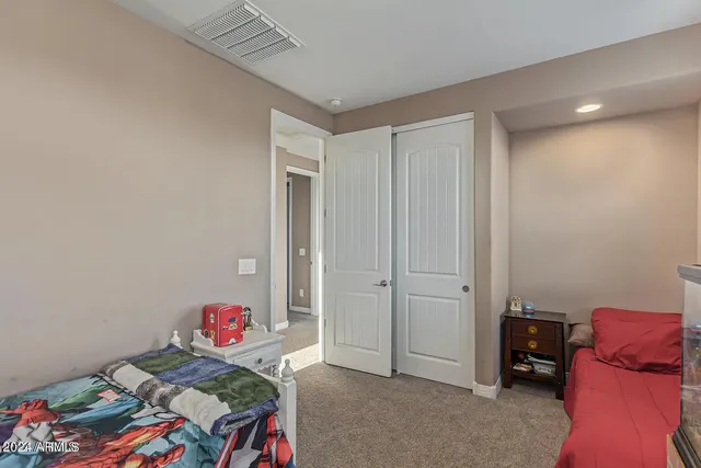 a room with toys and dresser