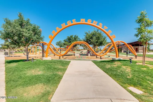 a view of swimming pool with a yard