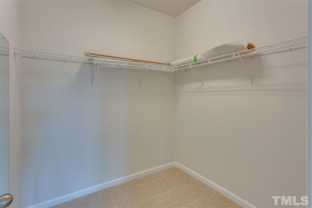 6033 Beale Loop, Unit 14 Raleigh, NC 27616 - Photo 12 of 18 walk in closet.