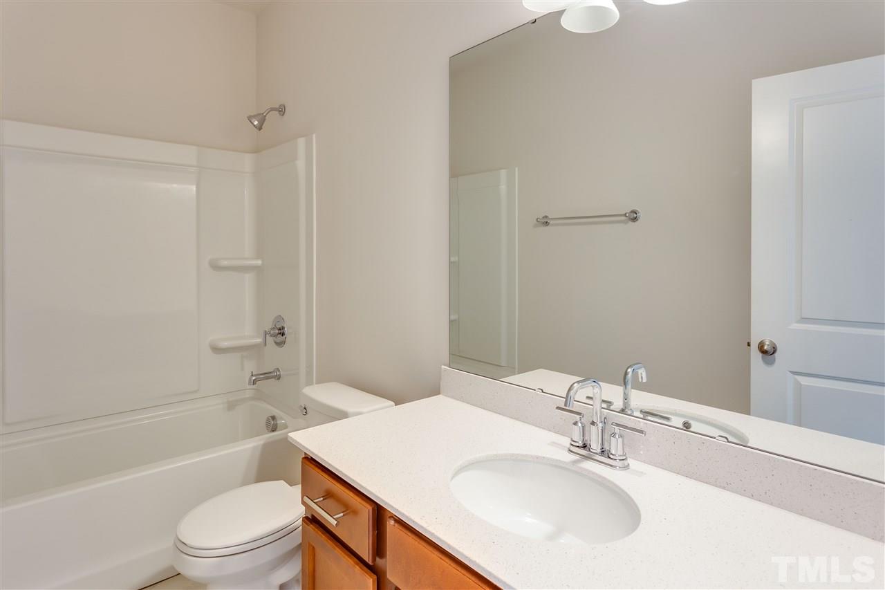 6033 Beale Loop, Unit 14 Raleigh, NC 27616 - Photo 13 of 18 Quartz counters.