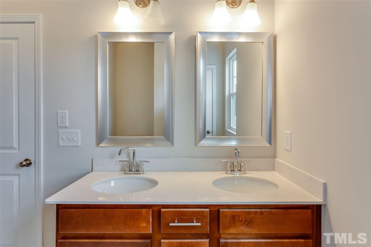 6033 Beale Loop, Unit 14 Raleigh, NC 27616 - Photo 10 of 18 Dual sinks, framed mirrors.