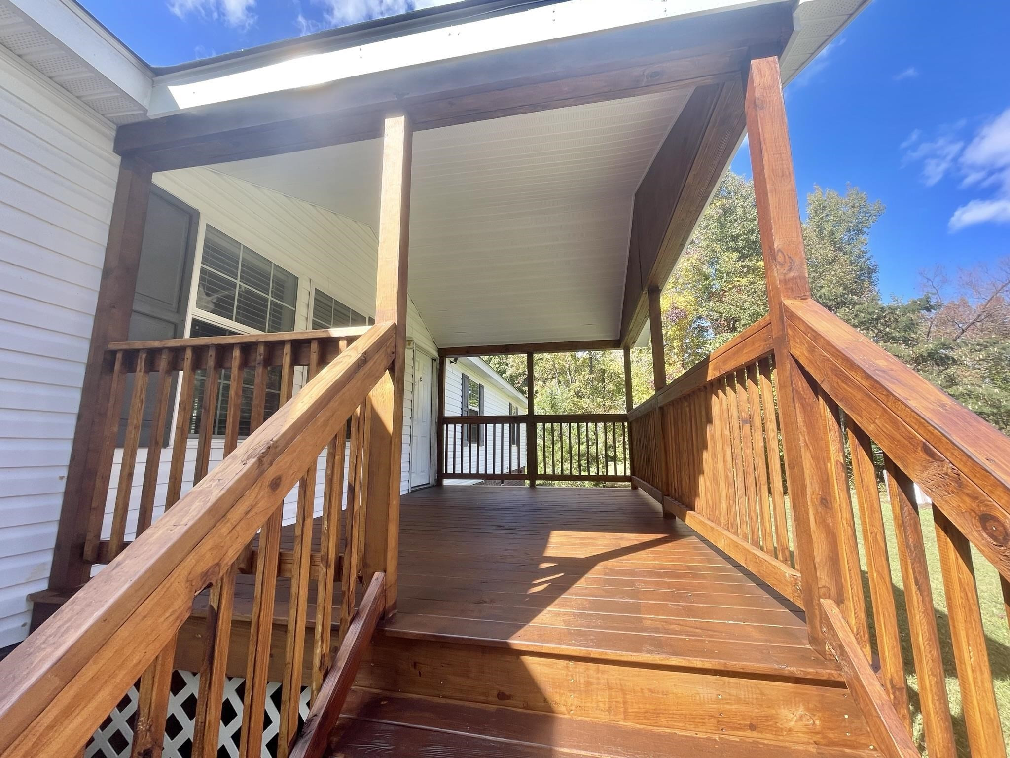 45 Divine Lane Roxboro, NC 27573 - Photo 3 of 28 a view of staircase with wooden floor and stairs