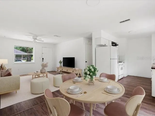 a view of a dining room with furniture