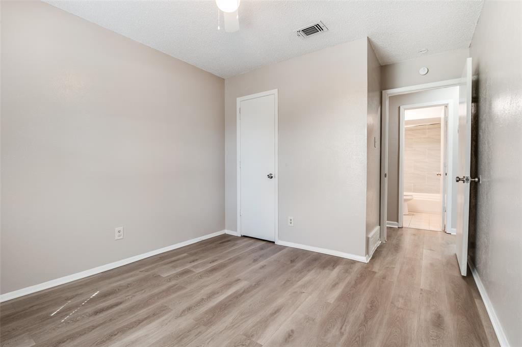 735 Middale Road Duncanville, TX 75116 - Photo 11 of 25 wooden floor in an empty room