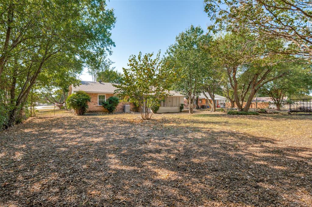 735 Middale Road Duncanville, TX 75116 - Photo 23 of 25 a view of a house with a yard