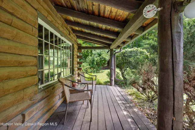 a view of balcony with wooden floor and outdoor space
