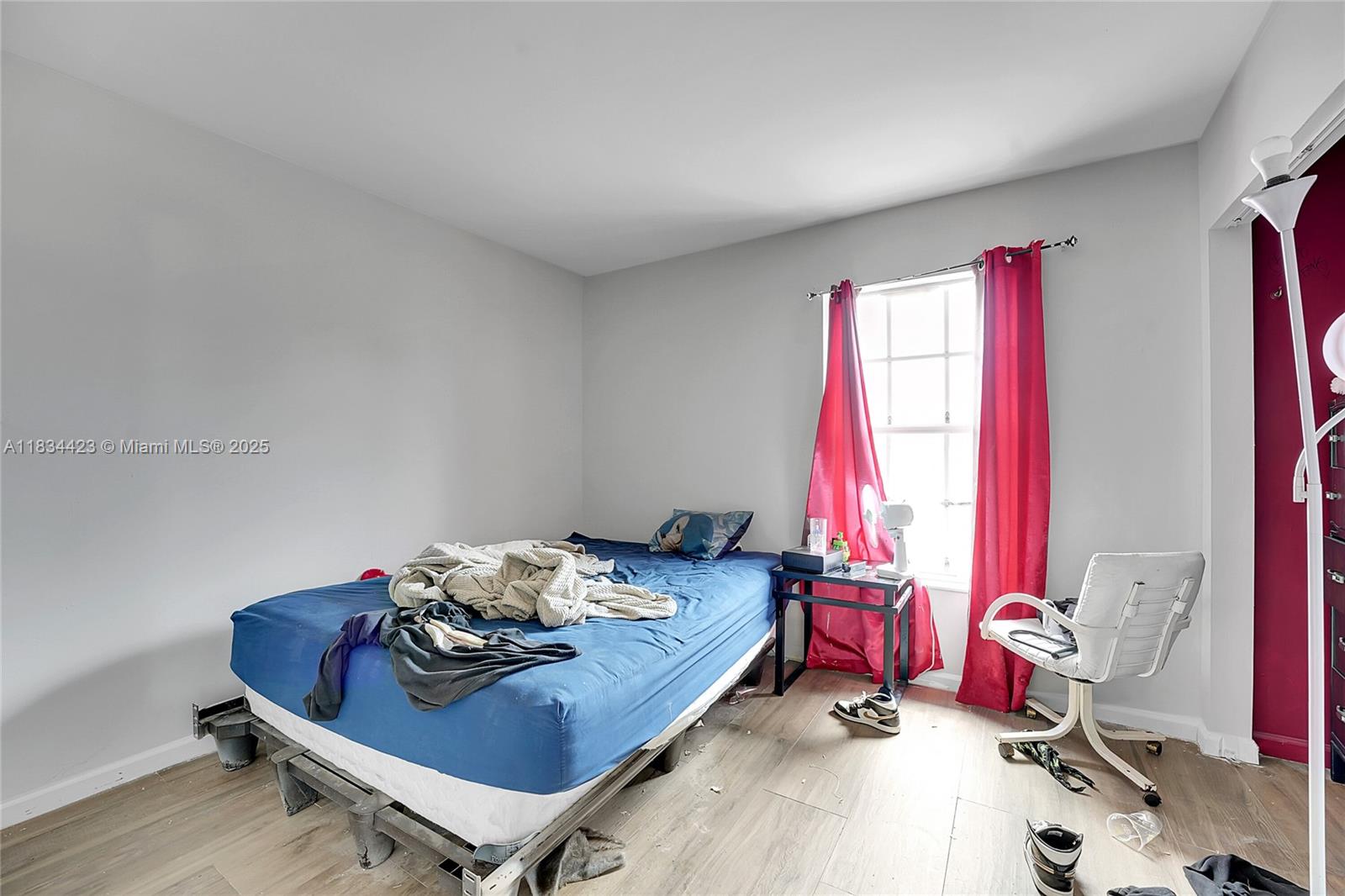 1303 West 6th Street Riviera Beach, FL 33404 - Photo 11 of 33 a living room with furniture and a window