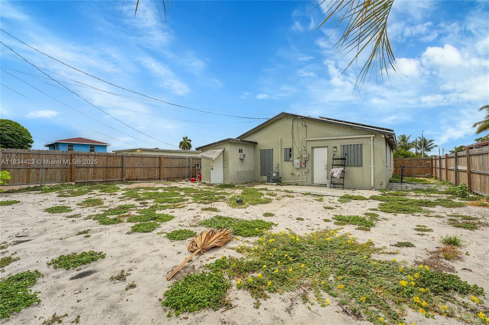 1303 West 6th Street Riviera Beach, FL 33404 - Photo 18 of 33 a view of a backyard