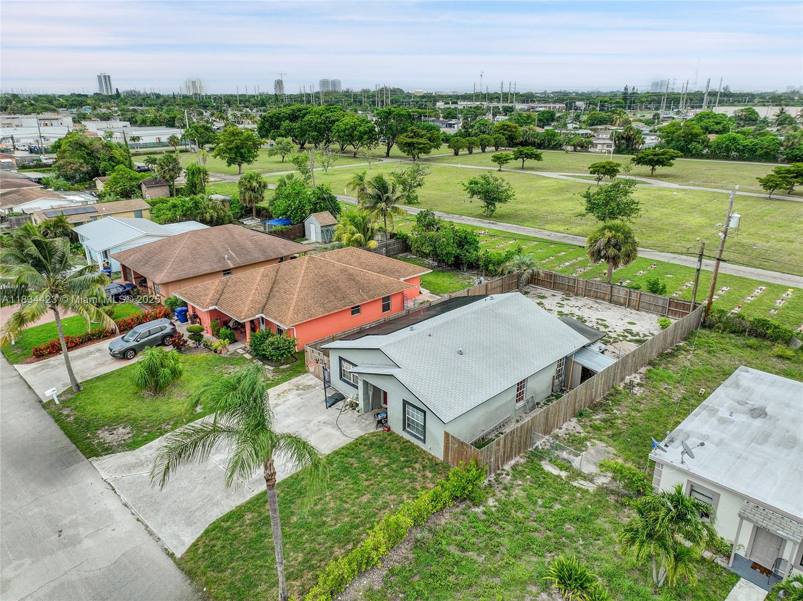 1303 West 6th Street Riviera Beach, FL 33404 - Photo 22 of 33 an aerial view of a house with outdoor space and street view