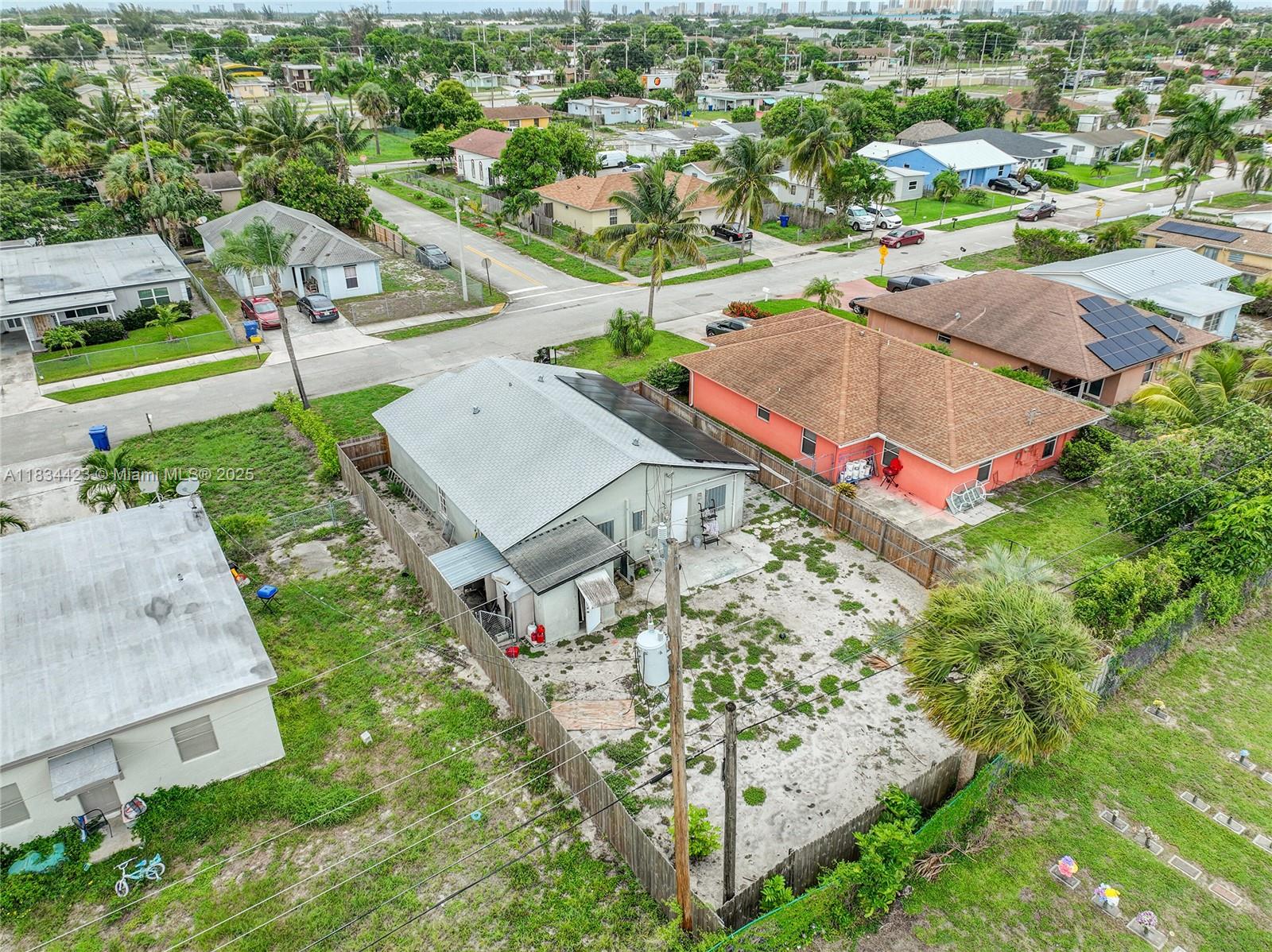 1303 West 6th Street Riviera Beach, FL 33404 - Photo 24 of 33 an aerial view of residential houses with outdoor space and street view