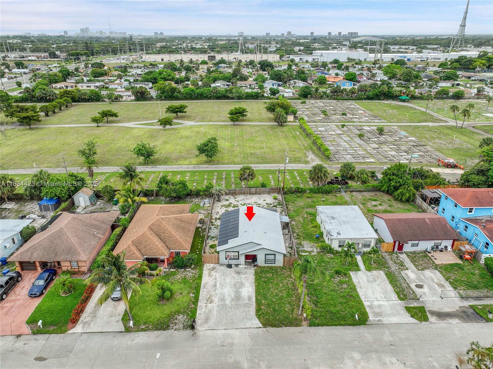 1303 West 6th Street Riviera Beach, FL 33404 - Photo 27 of 33 an aerial view of residential houses with outdoor space and lake view