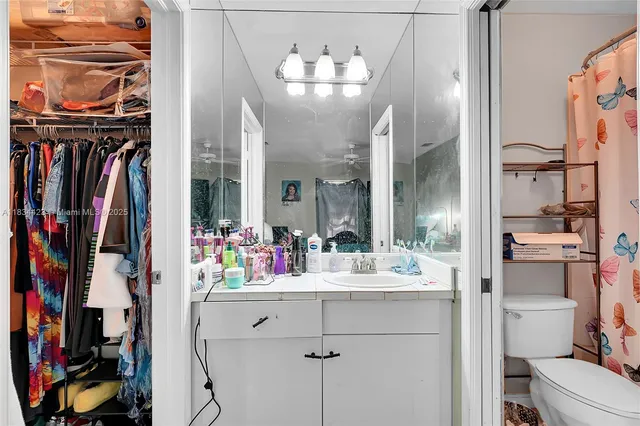 a view of a bathroom sink and a mirror