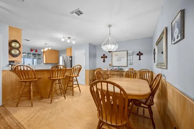 a view of a dining room with furniture