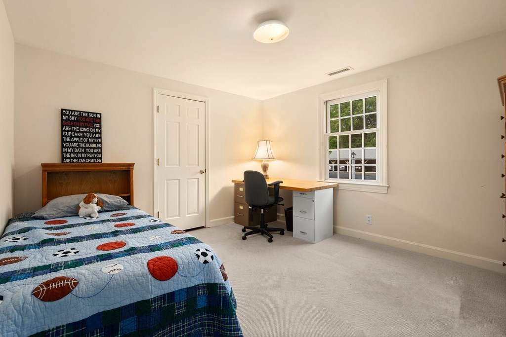 12 Jericho Road, Unit 12 Weston, MA 02493 - Photo 11 of 14 a room with furniture and a window