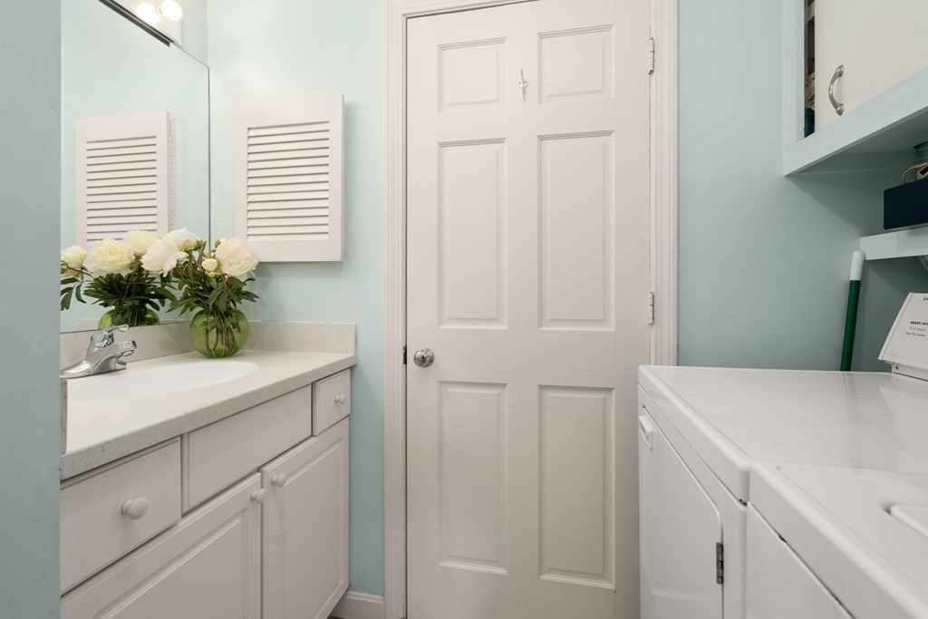 12 Jericho Road, Unit 12 Weston, MA 02493 - Photo 13 of 14 a bathroom with a sink and vanity