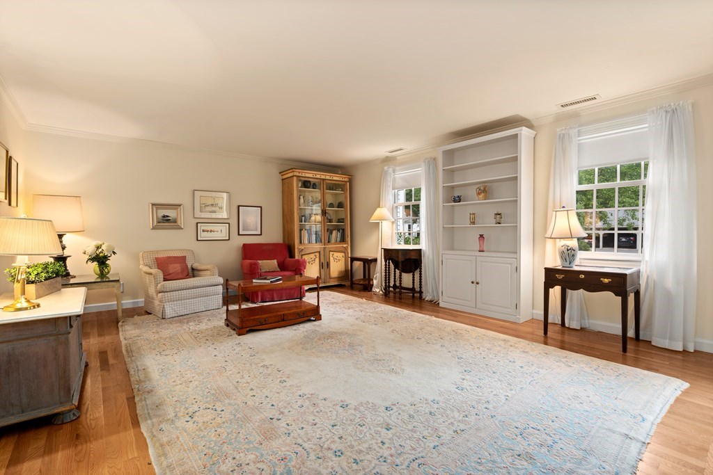 12 Jericho Road, Unit 12 Weston, MA 02493 - Photo 3 of 14 a bedroom with furniture and a large window