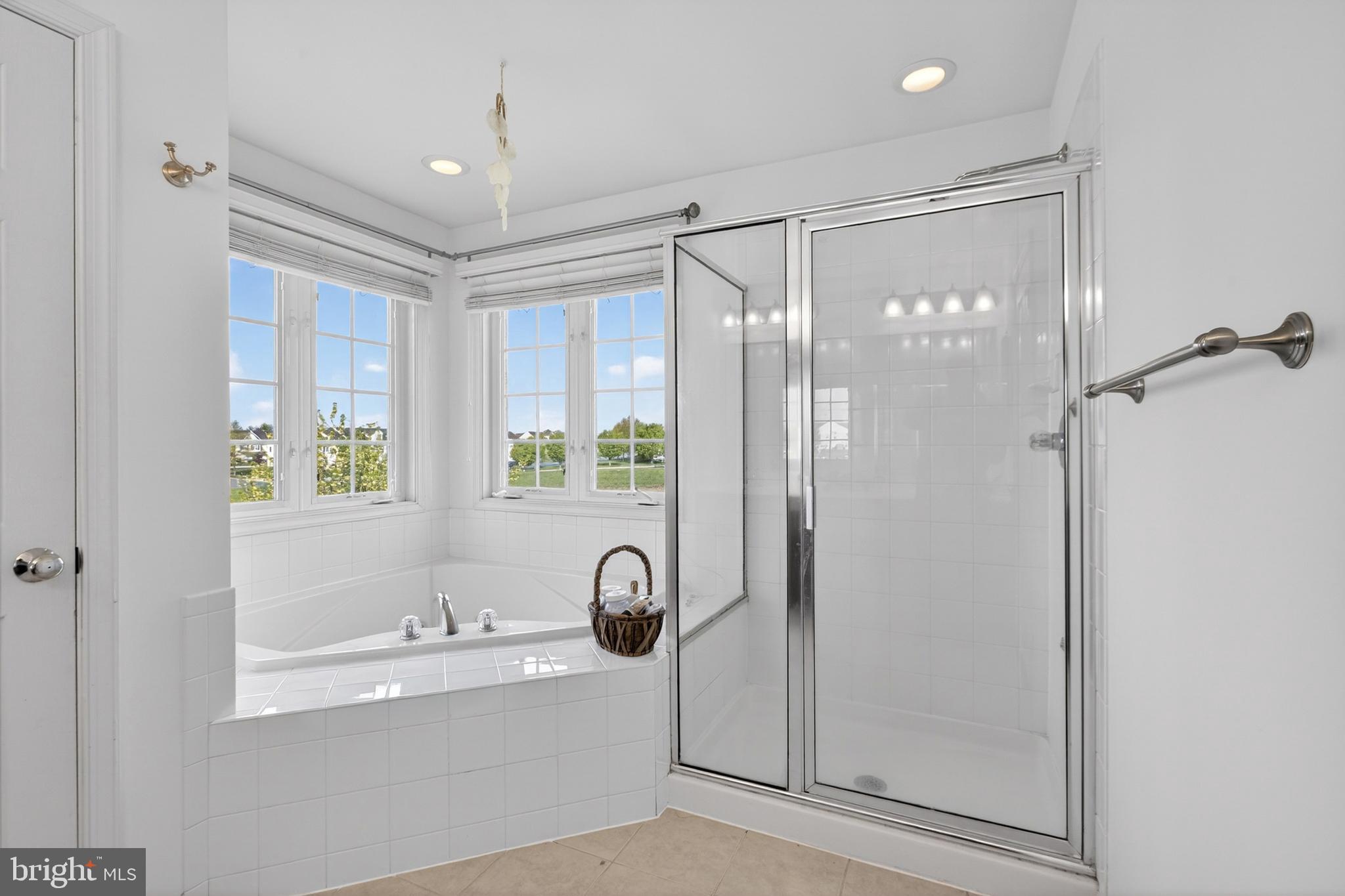 24 Springfield Circle Middletown, DE 19709 - Photo 43 of 72 a bathroom with a bathtub and a shower