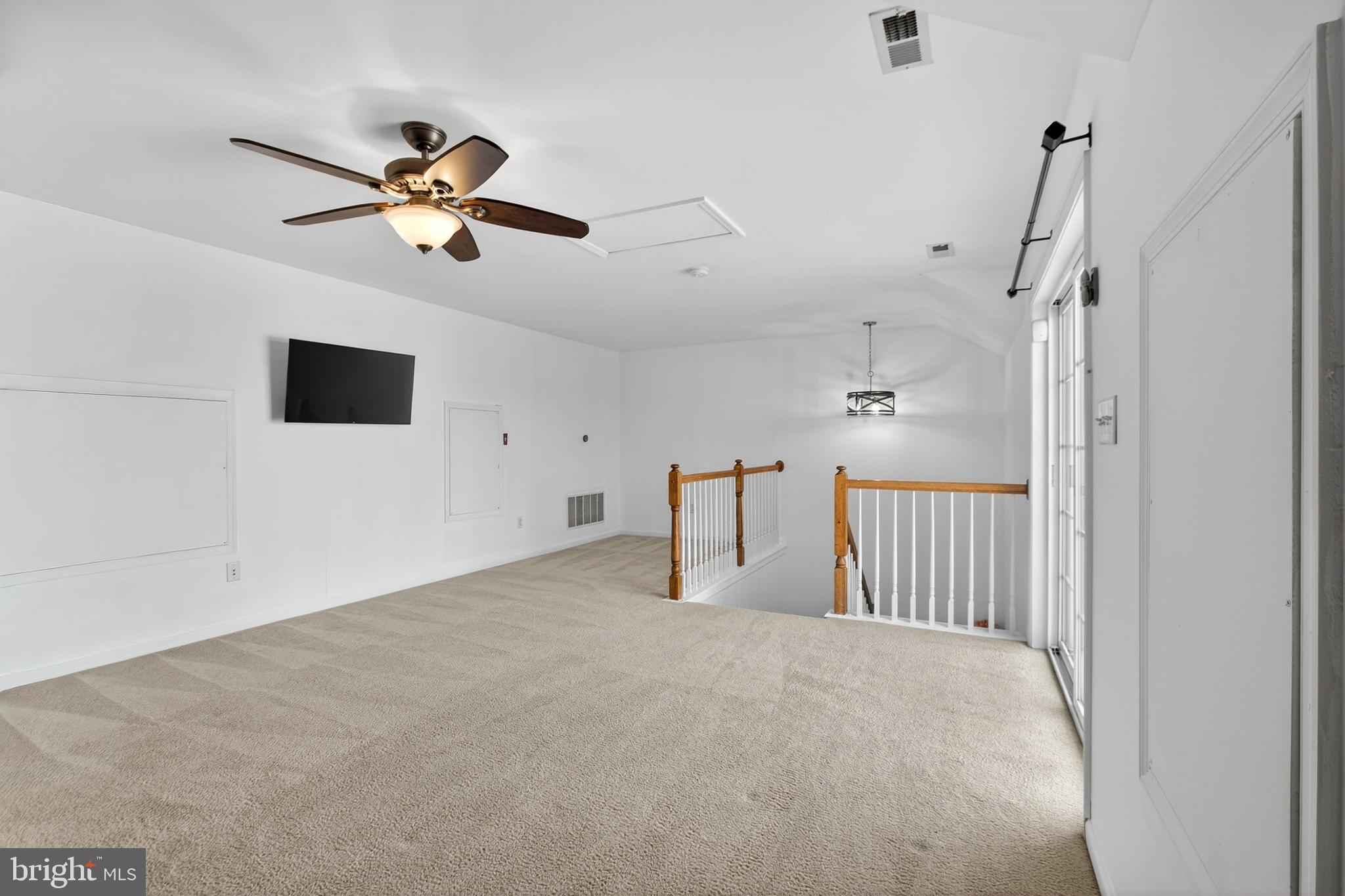 24 Springfield Circle Middletown, DE 19709 - Photo 46 of 72 a view of a livingroom with a ceiling fan and window