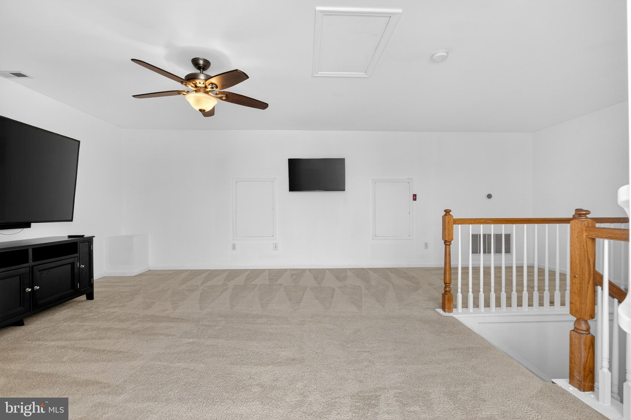 24 Springfield Circle Middletown, DE 19709 - Photo 47 of 72 a view of a livingroom with a flat screen tv