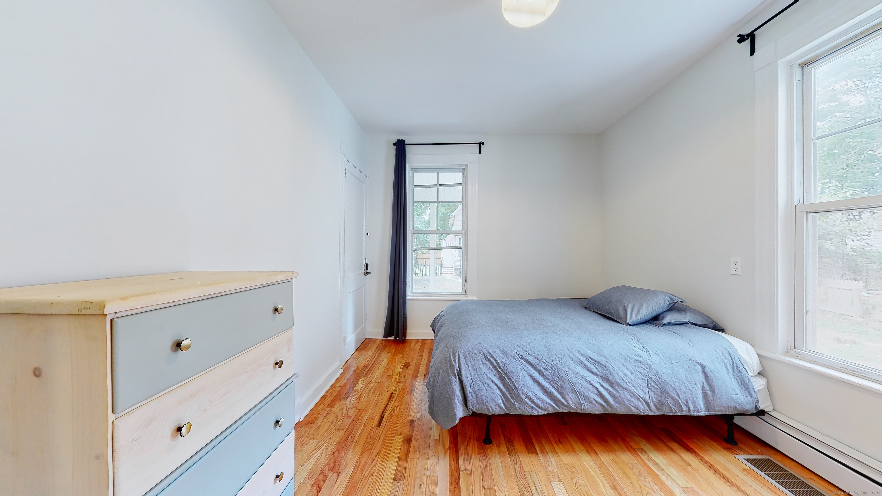 86 Edwards Street, Unit 1 New Haven, CT 06511 - Photo 19 of 40 a bedroom with a bed and window