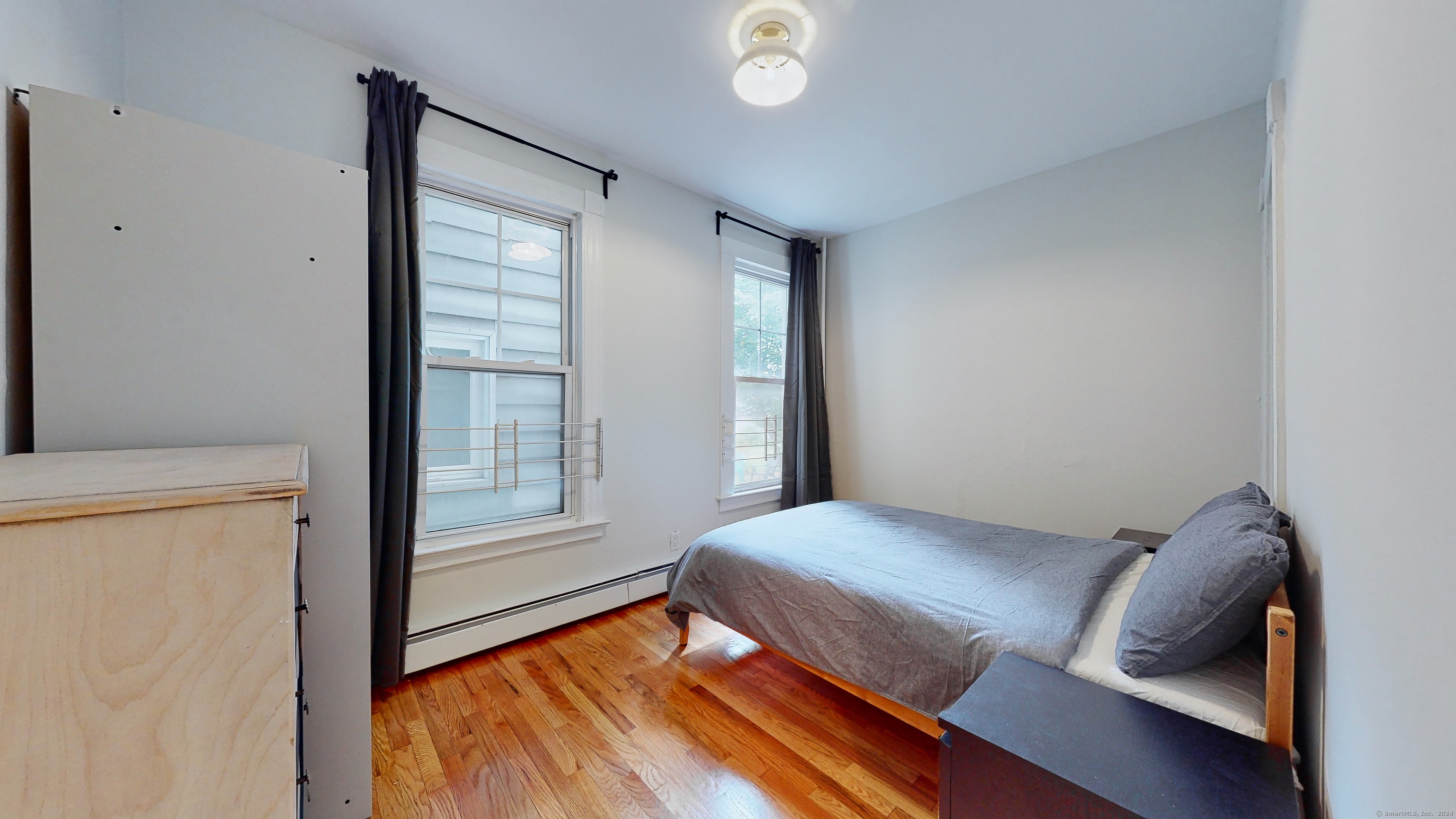 86 Edwards Street, Unit 1 New Haven, CT 06511 - Photo 21 of 40 a bedroom with a bed and a window