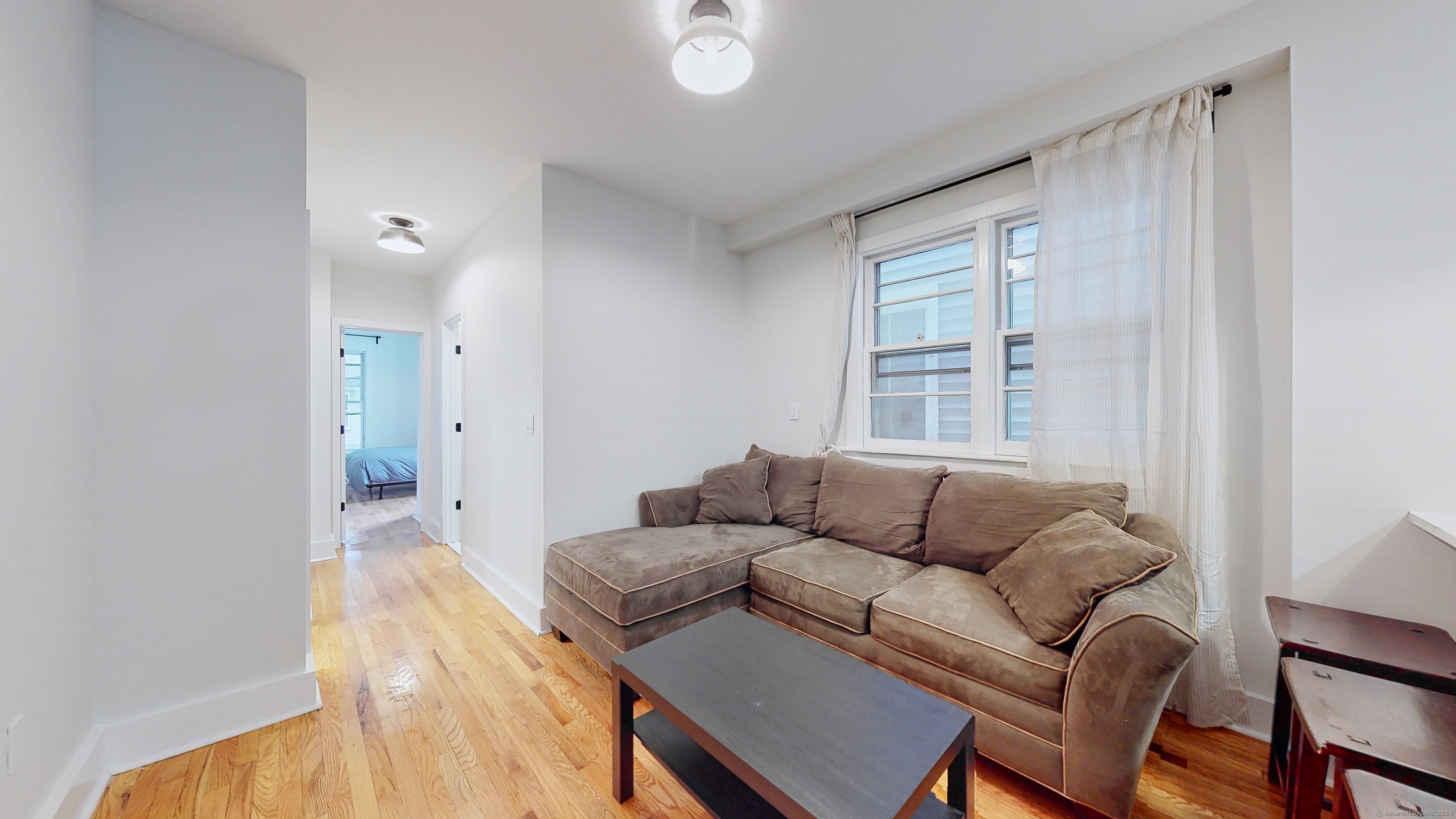 86 Edwards Street, Unit 1 New Haven, CT 06511 - Photo 24 of 40 a living room with furniture and a window