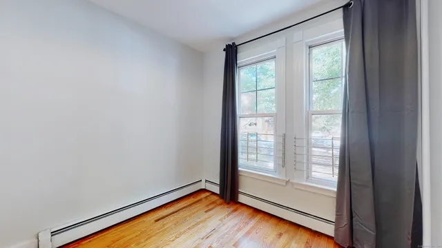 a view of an empty room and window