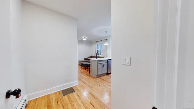a view of a kitchen with a sink