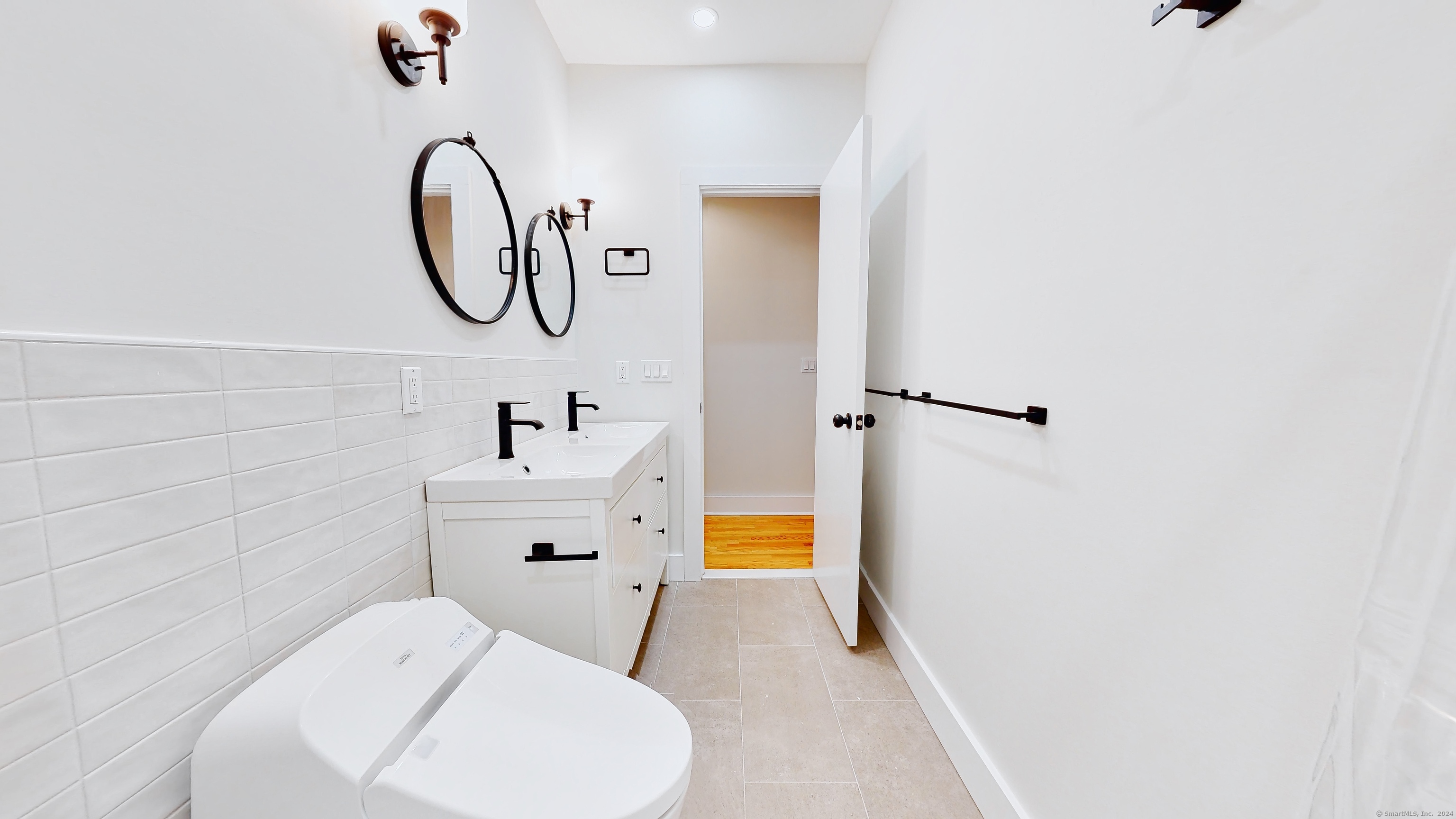 86 Edwards Street, Unit 1 New Haven, CT 06511 - Photo 37 of 40 a bathroom with a sink a toilet and a mirror