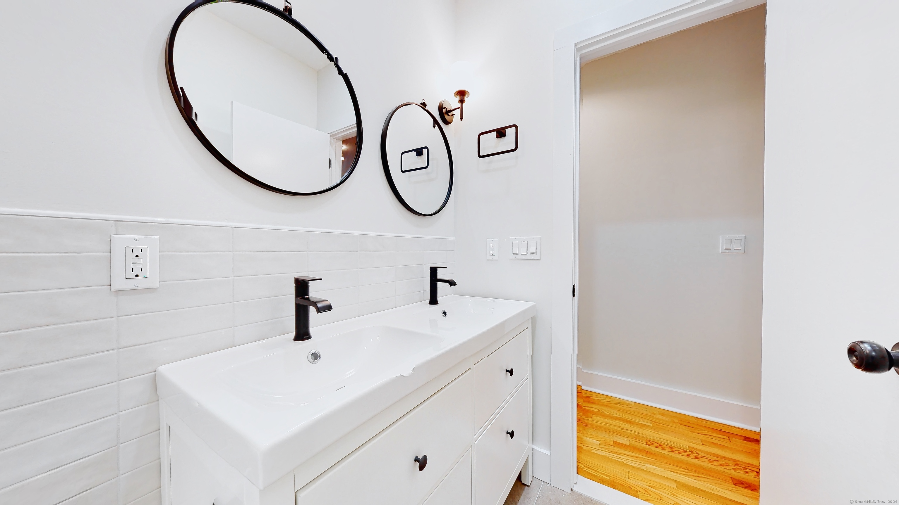 86 Edwards Street, Unit 1 New Haven, CT 06511 - Photo 39 of 40 a bathroom with a sink and a mirror