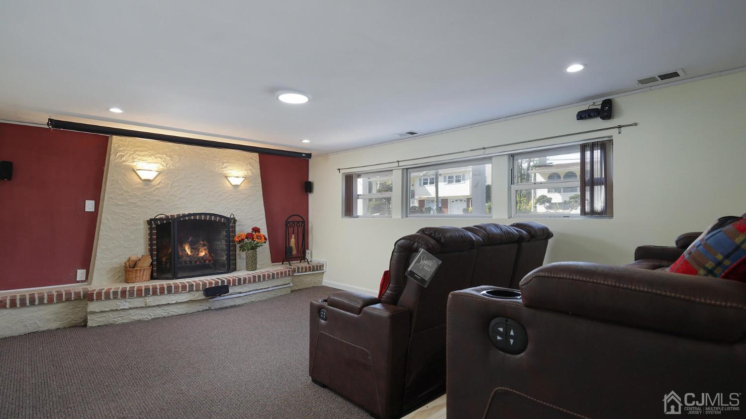 20 Peake Road Edison, NJ 08837 - Photo 25 of 34 a living room with furniture and a flat screen tv