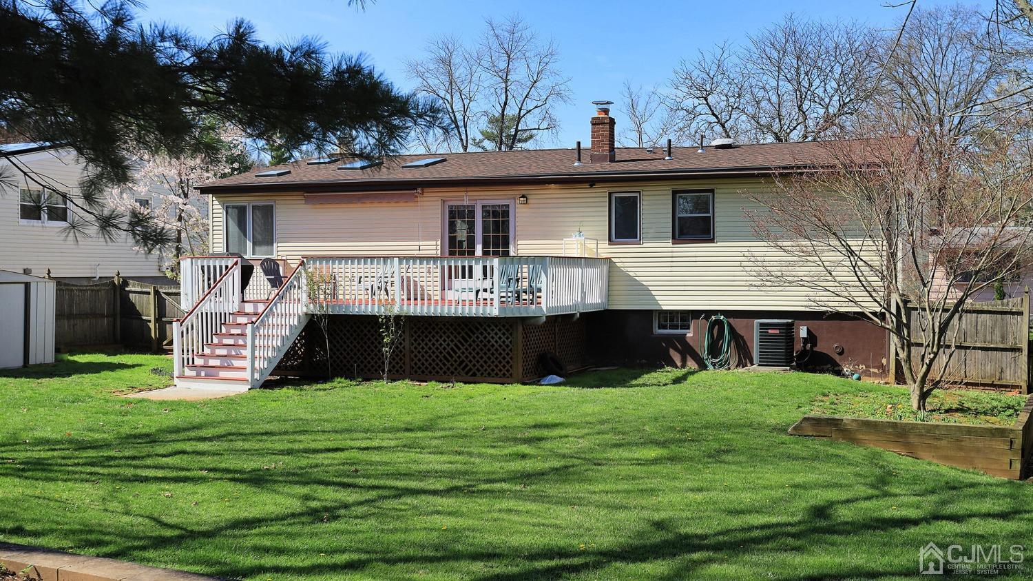 20 Peake Road Edison, NJ 08837 - Photo 31 of 34 a view of a house with a yard