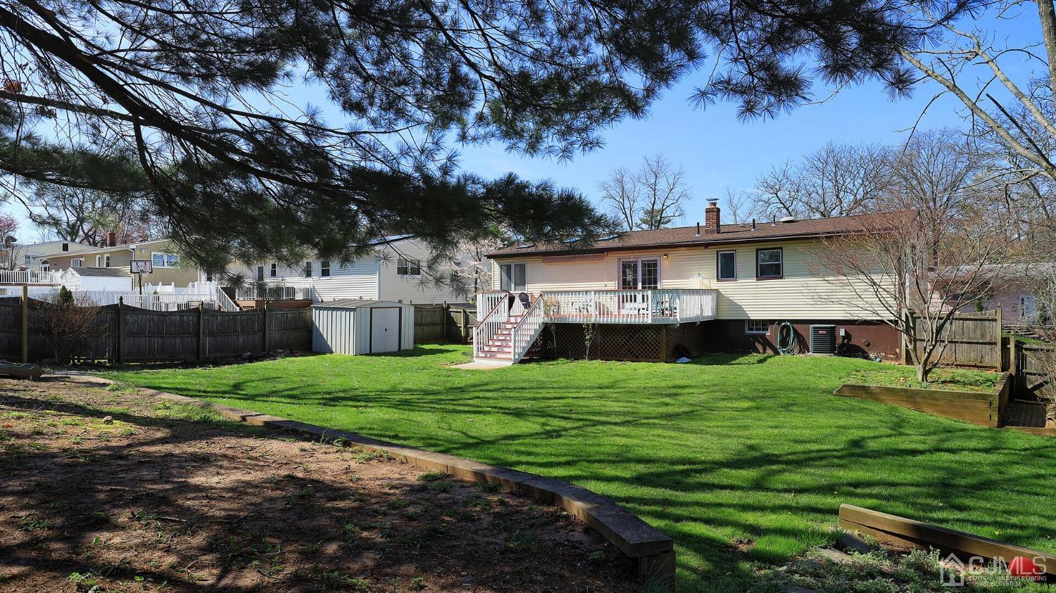 20 Peake Road Edison, NJ 08837 - Photo 32 of 34 a view of house with backyard