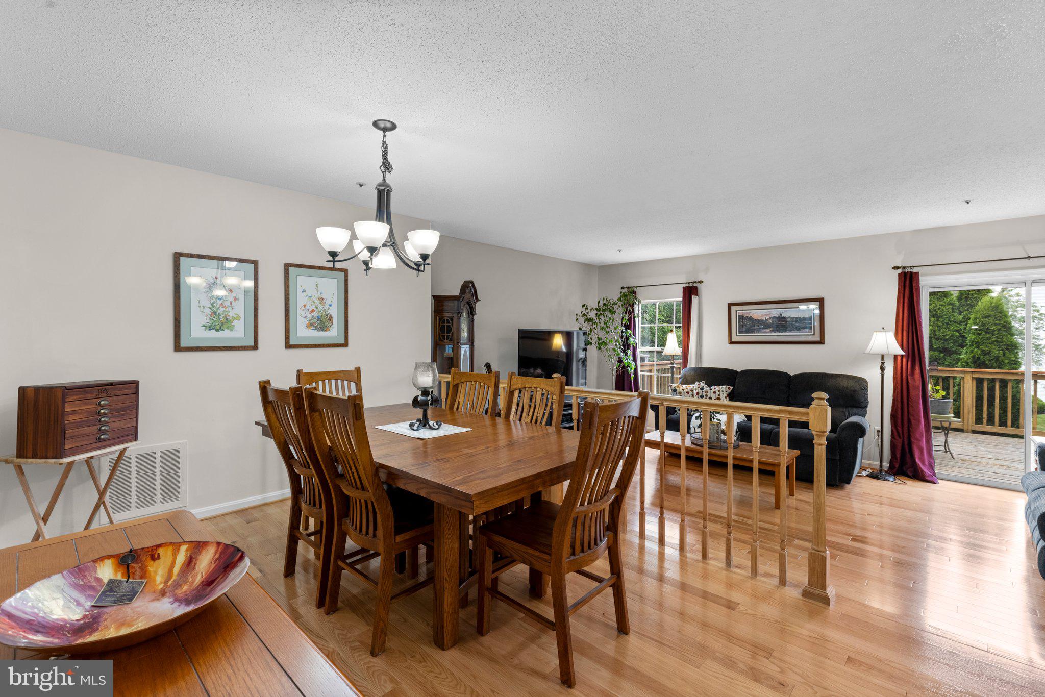 1510 Arcola Court Crofton, MD 21114 - Photo 13 of 29 Separate dining room with hardwoods.