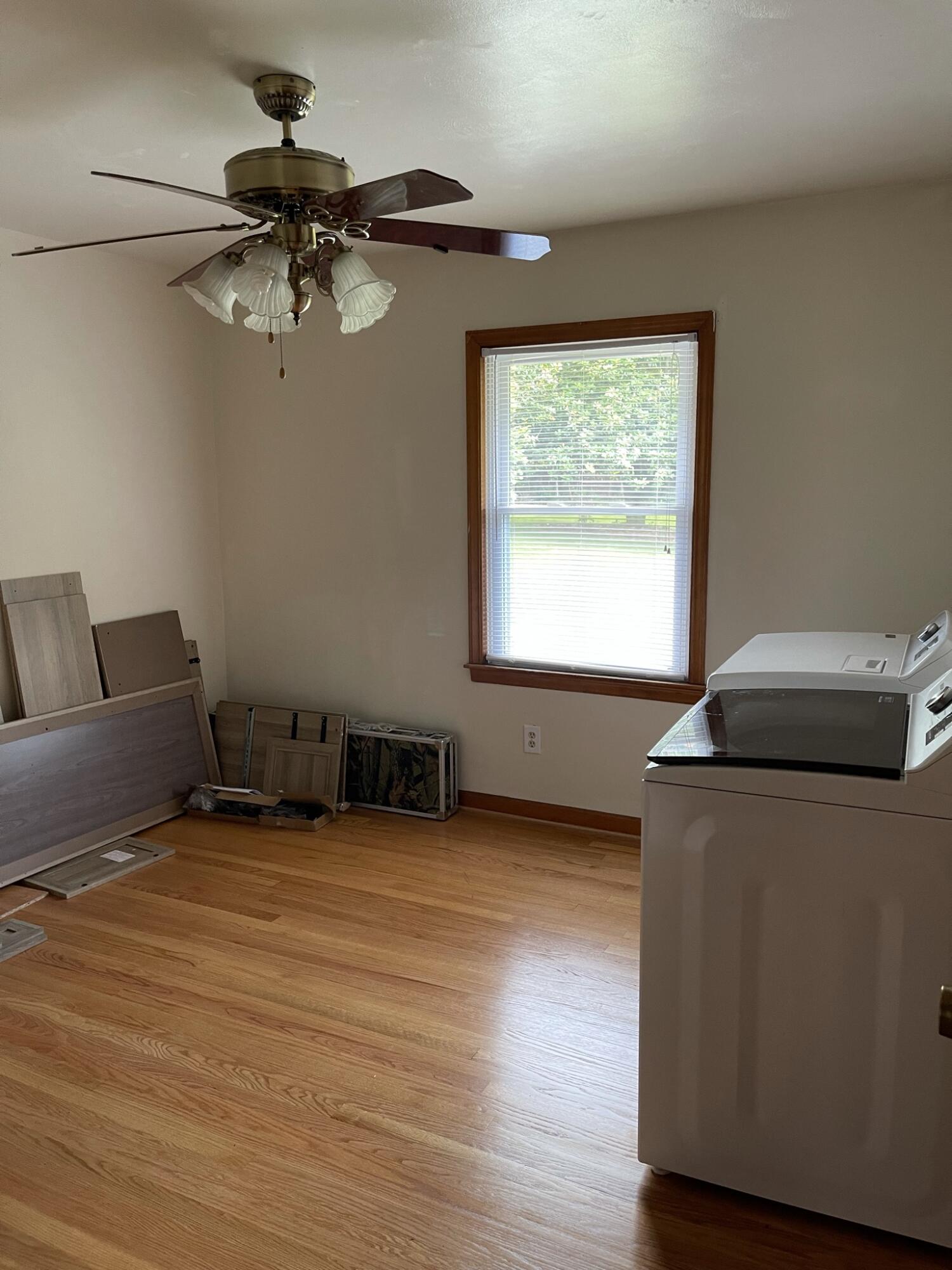 1135 Oddfellows Road Vinton, VA 24179 - Photo 14 of 34 a view of a livingroom with furniture and a ceiling fan