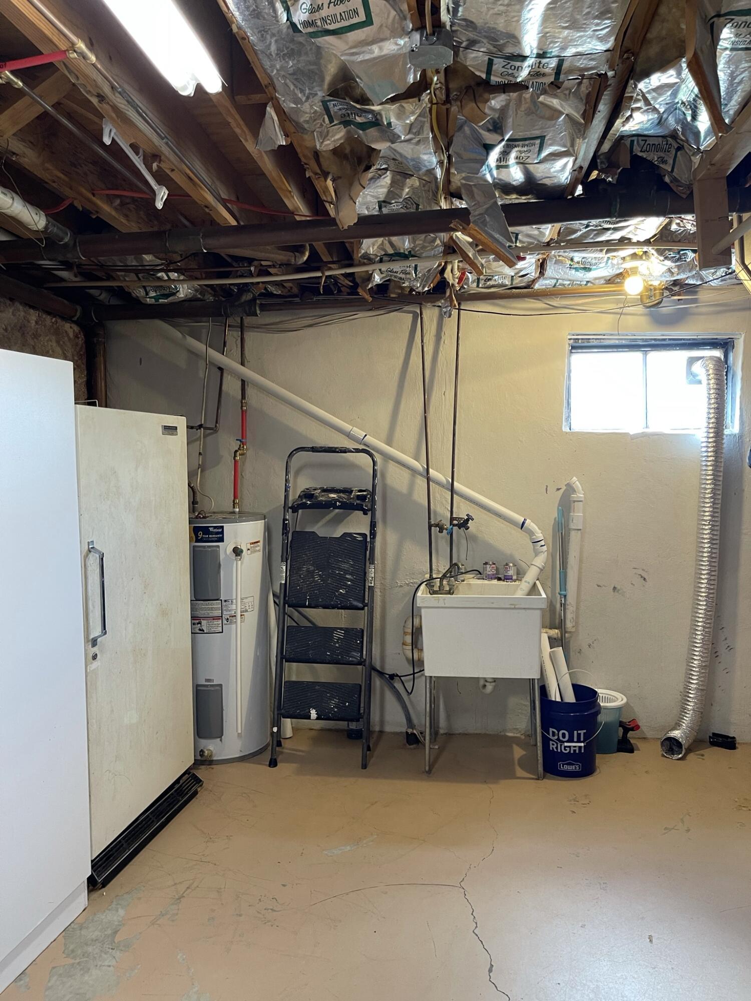 1135 Oddfellows Road Vinton, VA 24179 - Photo 30 of 34 a view of water heater room with refrigerator