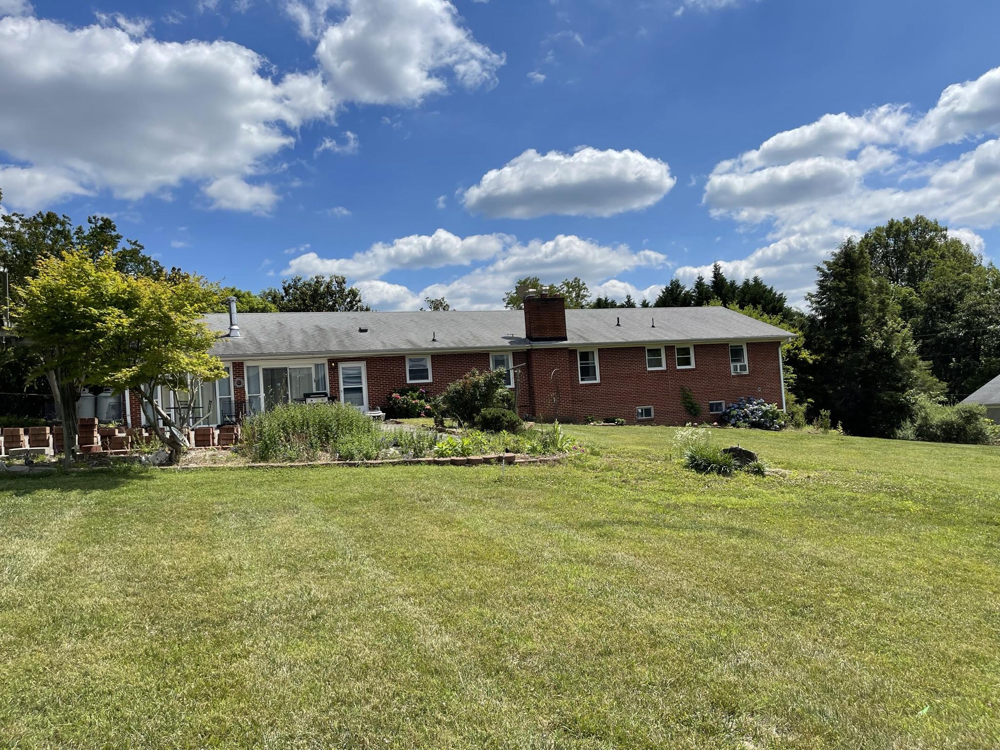 1135 Oddfellows Road Vinton, VA 24179 - Photo 34 of 34 a view of a house with a yard