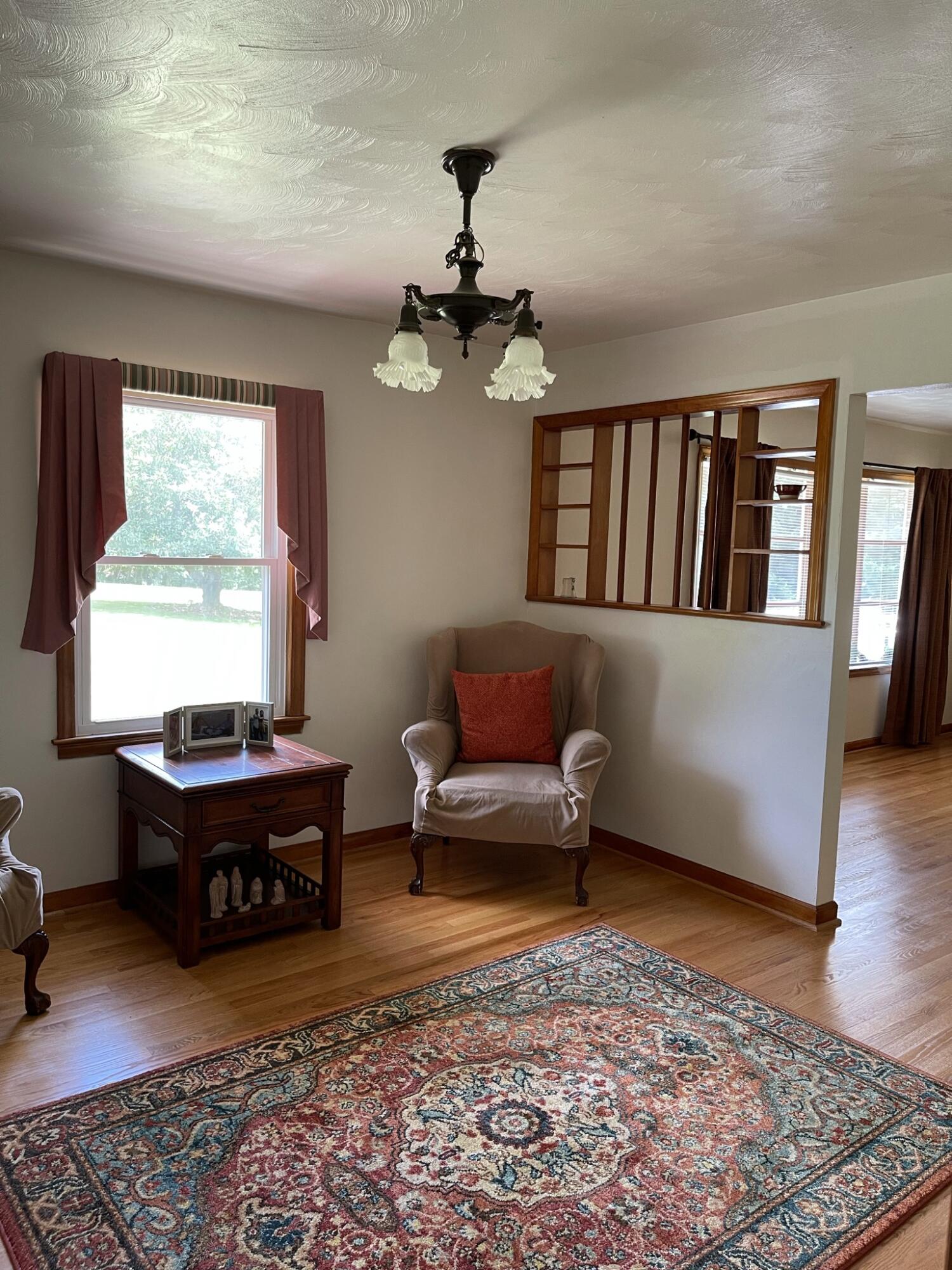 1135 Oddfellows Road Vinton, VA 24179 - Photo 9 of 34 a living room with furniture rug and window