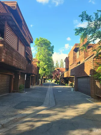 a view of a house with a street