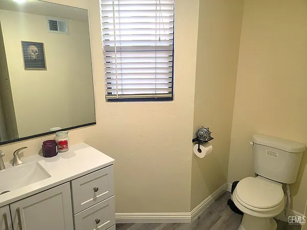 a bathroom with a sink and a toilet