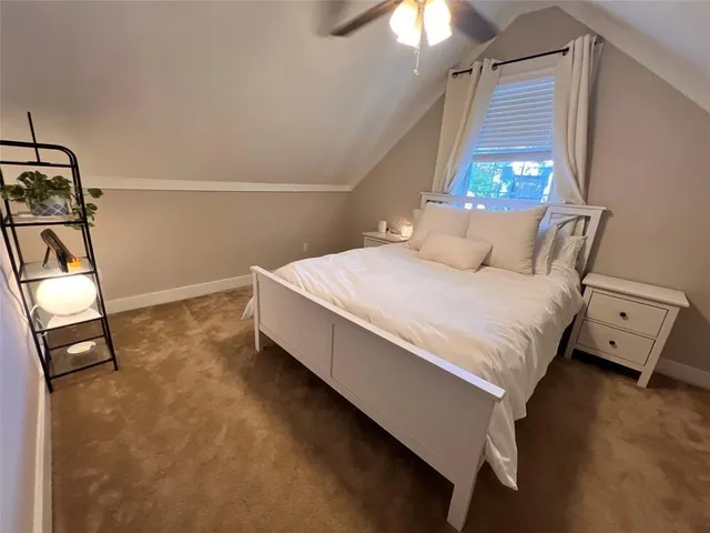 a room with window and closet