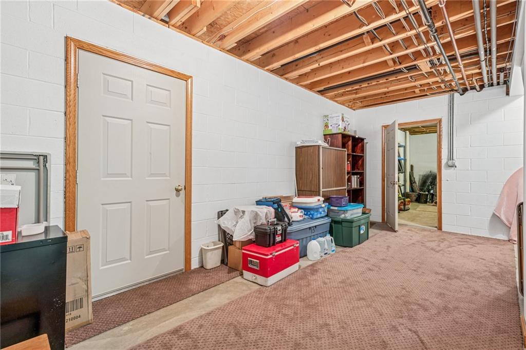 404 Oneida Trail Mercer, PA 16137 - Photo 32 of 50 Additional storage in the basement, complete with a pocket for refrigerator & freezer (not included).
