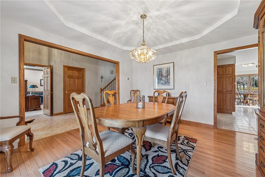 404 Oneida Trail Mercer, PA 16137 - Photo 9 of 50 The dining room boats hardwood floors and a tray ceiling, flowing nicely from the entrance into the kitchen