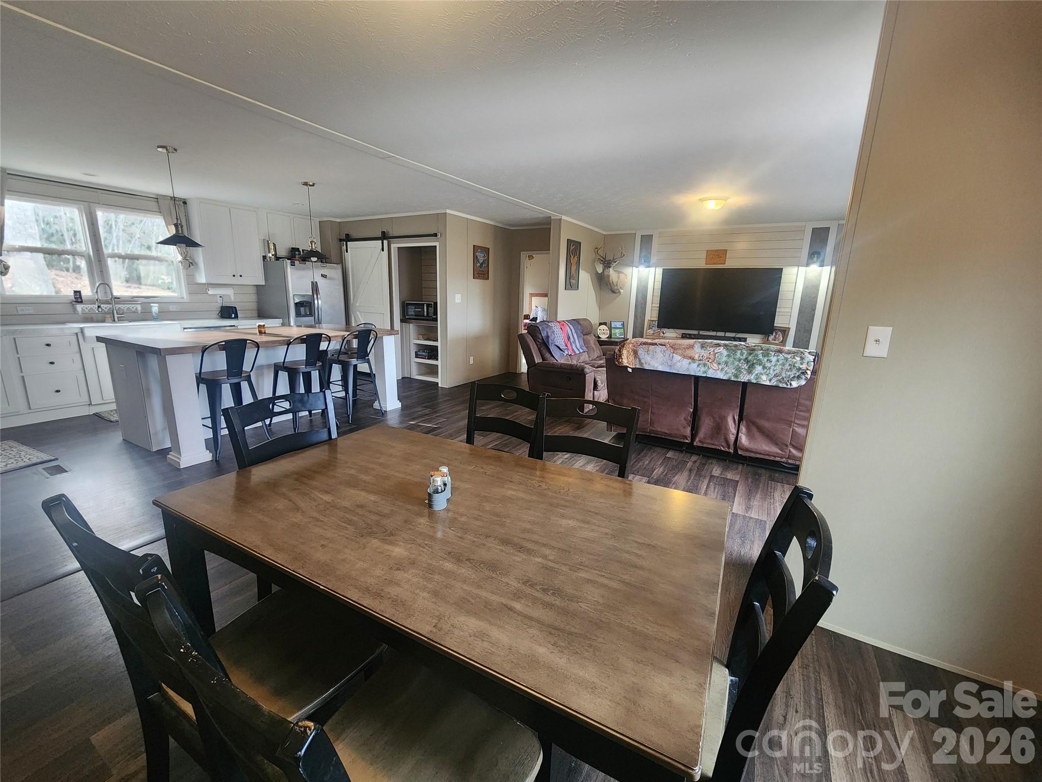 659 Cold Creek Road Canton, NC 28716 - Photo 30 of 37 a dining room with furniture and window