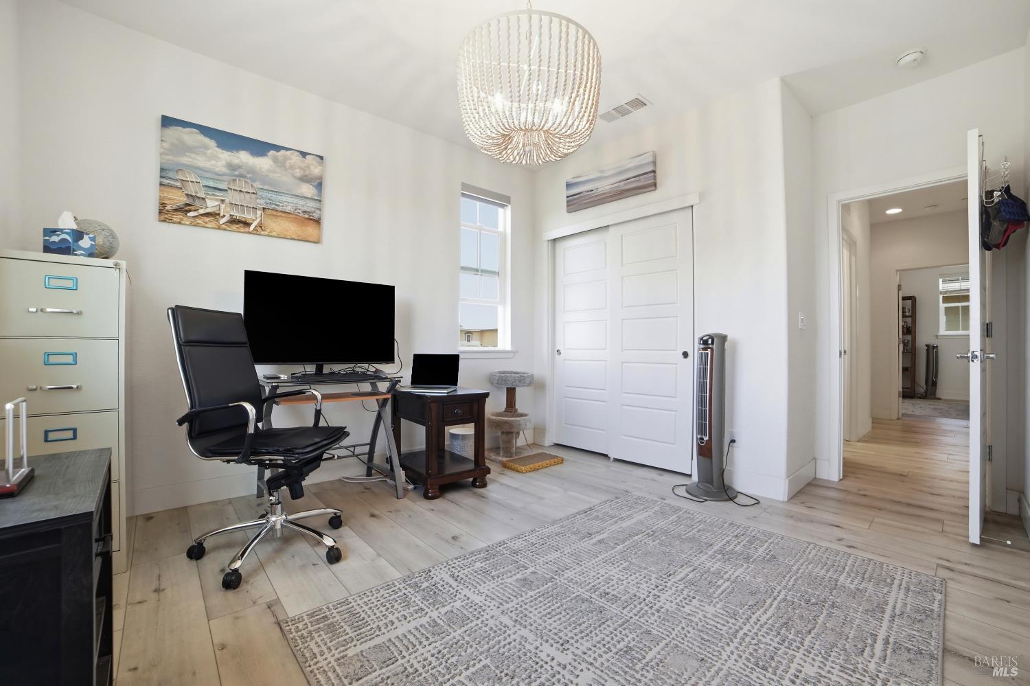 5305 Kirby Place Rohnert Park, CA 94928 - Photo 23 of 37 a view of a workspace with furniture and a chandelier