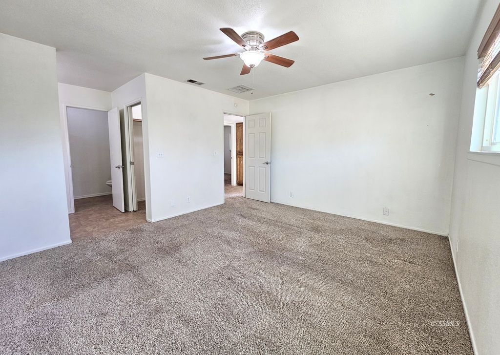 341 South Fountain Street Ridgecrest, CA 93555 - Photo 13 of 25 a view of a livingroom with a ceiling fan