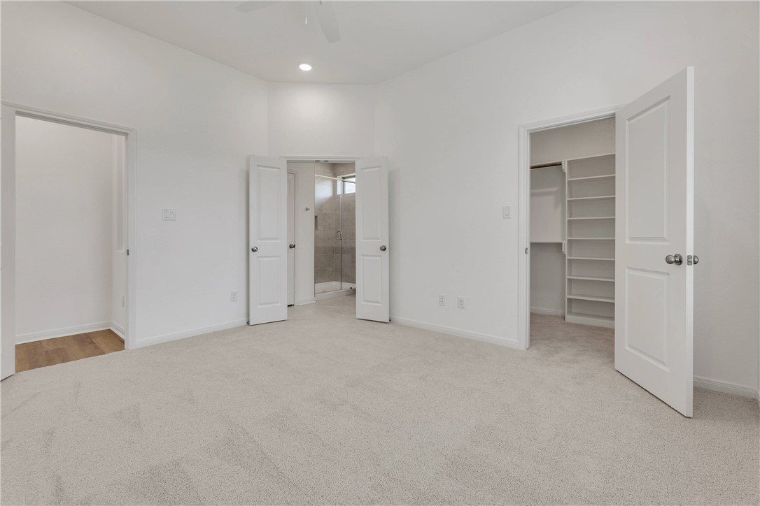 2776 Messenger Way Bryan, TX 77803 - Photo 12 of 16 wooden floor and closet in a room